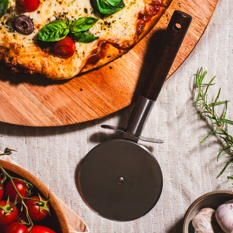 Corta pizza 9cm mango de Acacia